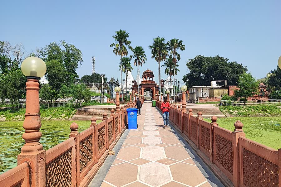 The white marble Jal Mandir temple at Pawapuri, reached by a long red stone bridge over a lotus pond
