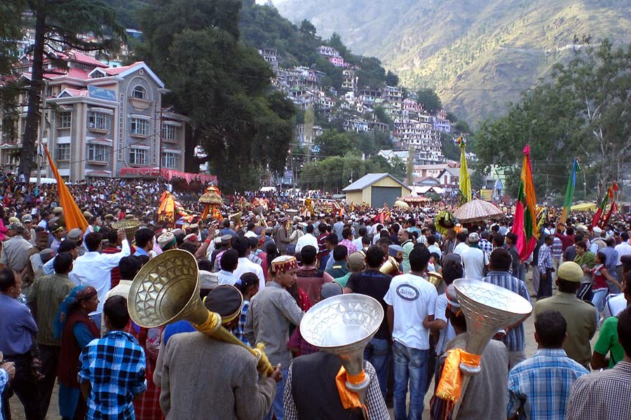 Crowds and musicians at the main procession of Kullu Dussehra